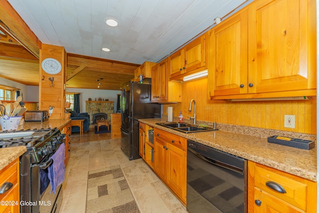 kitchen featuring light stone counters, black appliances, wood ceiling, sink, and light tile floors