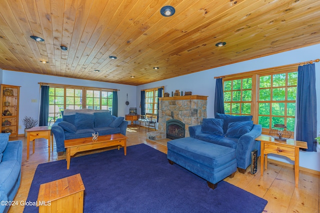 living room featuring wooden ceiling, hardwood / wood-style floors, and a fireplace