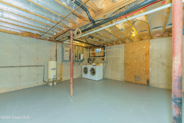 basement with washing machine and clothes dryer