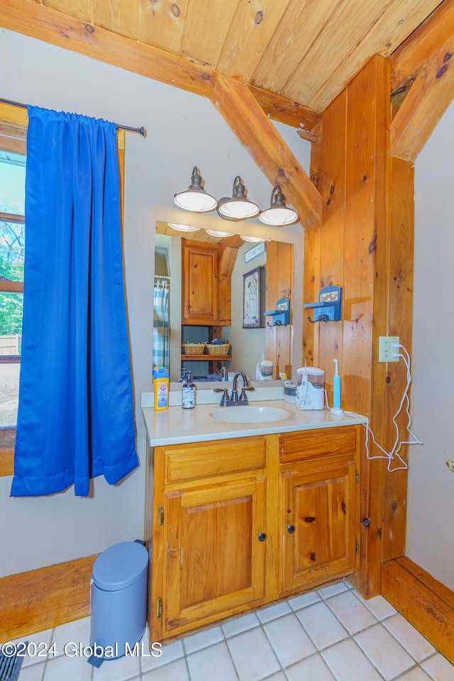 bathroom with tile flooring and oversized vanity