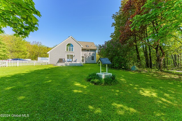 view of yard with a wooden deck