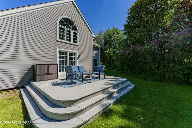 deck featuring a lawn