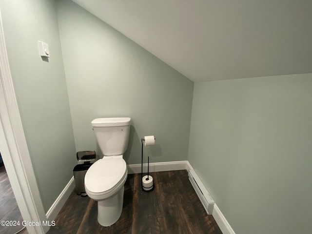 bathroom featuring lofted ceiling, hardwood / wood-style flooring, a baseboard radiator, and toilet