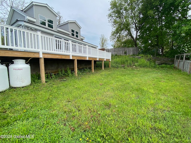 view of yard with a deck