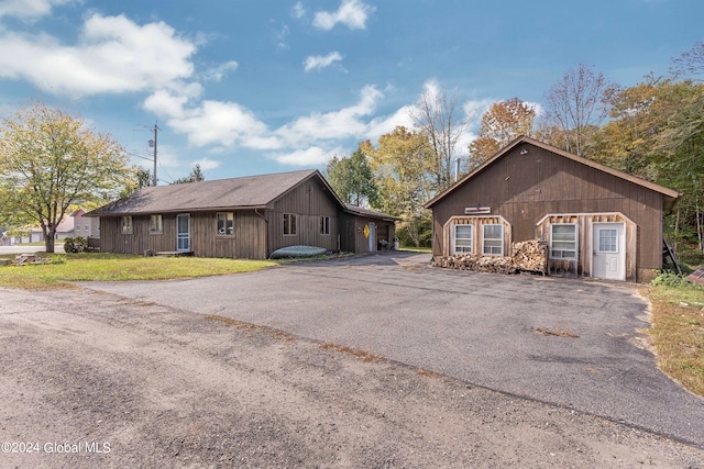 view of side of home with a garage