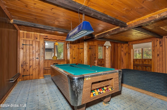 rec room with wooden ceiling, wooden walls, pool table, beamed ceiling, and light colored carpet