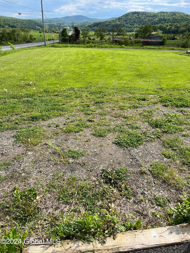 exterior space with a rural view