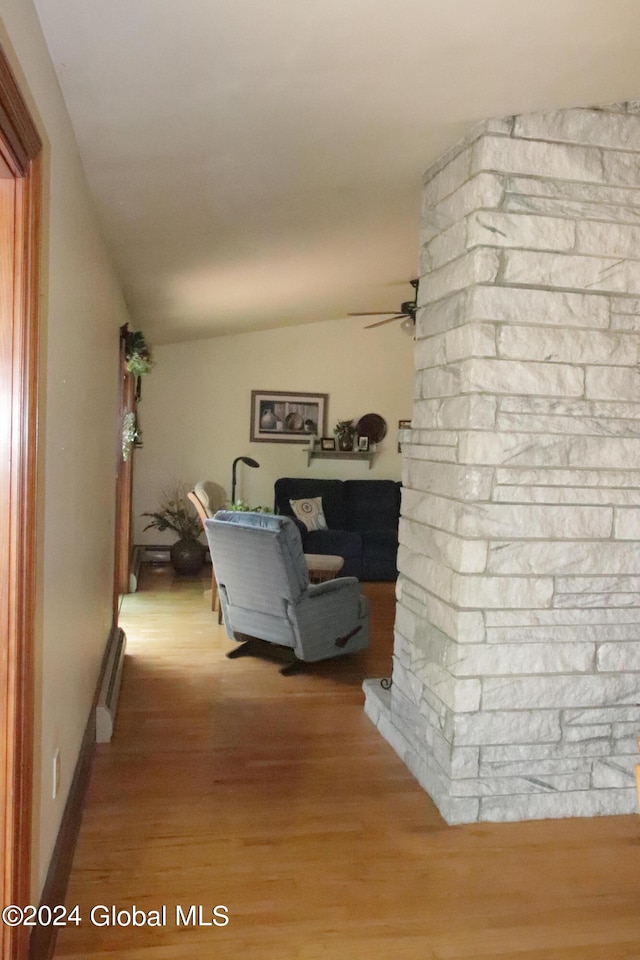 interior space with lofted ceiling and wood-type flooring