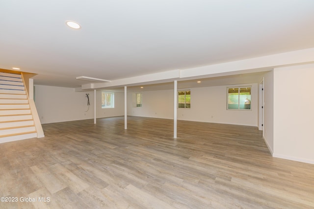 basement featuring light hardwood / wood-style floors