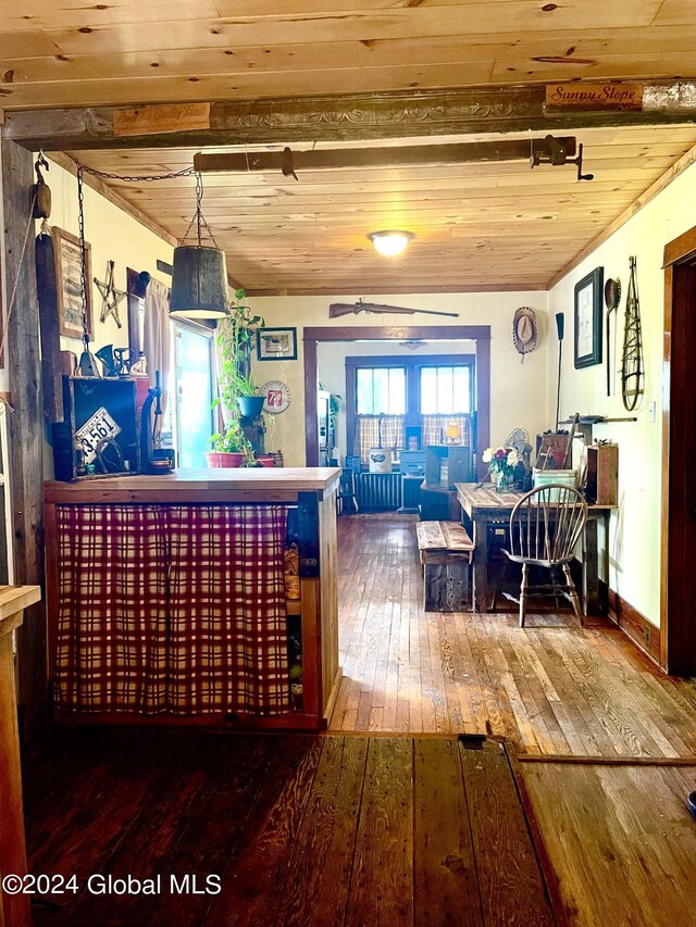 interior space with wooden ceiling and hardwood / wood-style flooring