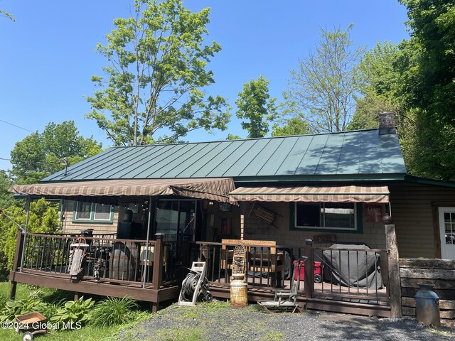 exterior space with a wooden deck