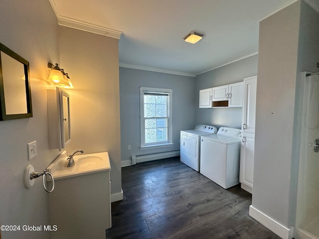 washroom with crown molding, washer and clothes dryer, dark hardwood / wood-style floors, sink, and baseboard heating