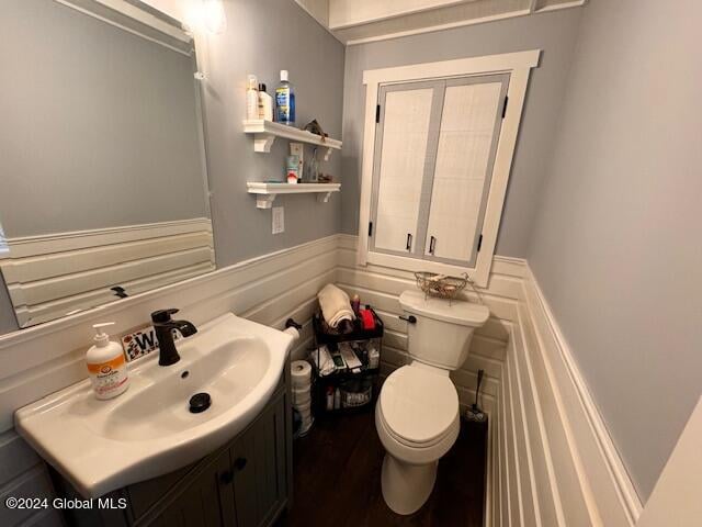 bathroom with vanity and toilet