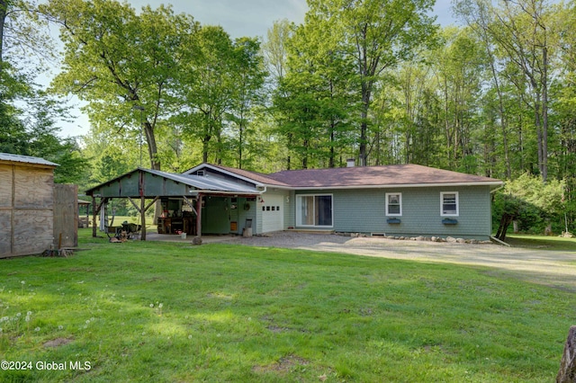 view of front of property with a front yard and a patio