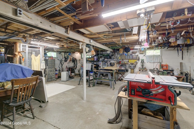 basement with a workshop area