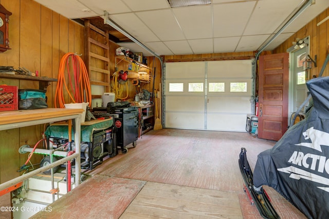 garage with wood walls