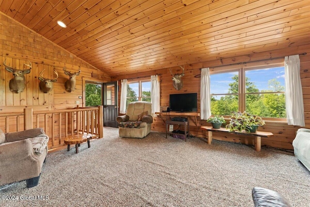 living room featuring carpet, wooden walls, lofted ceiling, and wooden ceiling