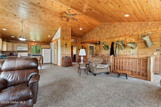 carpeted living room with high vaulted ceiling, wooden ceiling, wooden walls, and ceiling fan