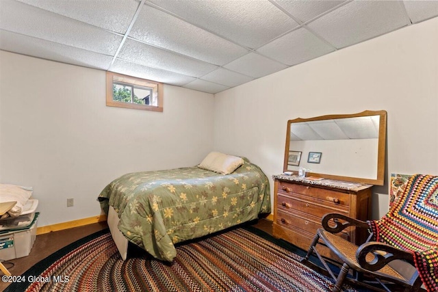 bedroom with a paneled ceiling