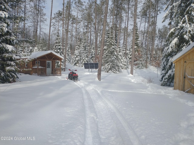 view of yard covered in snow