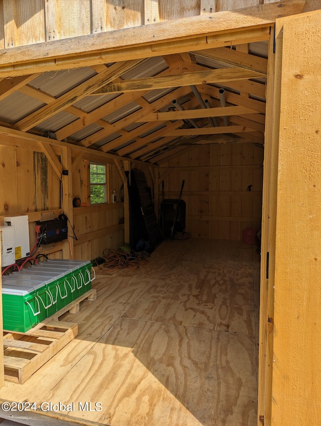 game room with vaulted ceiling