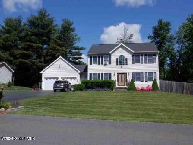1 Squire Rd, Colonie, NY 12304 - colonial house with driveway and a garage