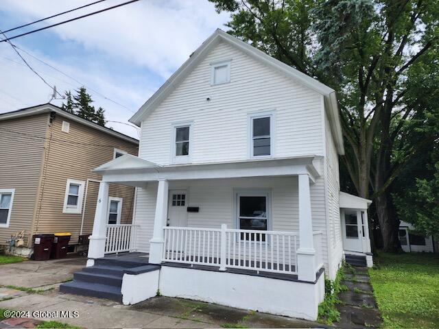 view of front of property featuring covered porch