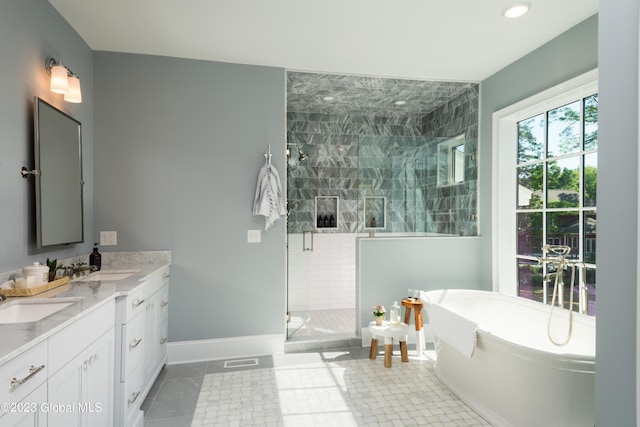 bathroom with vanity, separate shower and tub, and tile patterned flooring