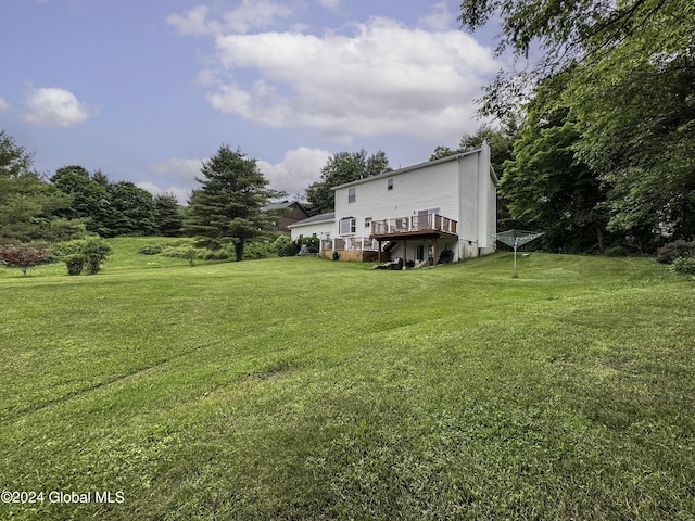 view of yard with a deck