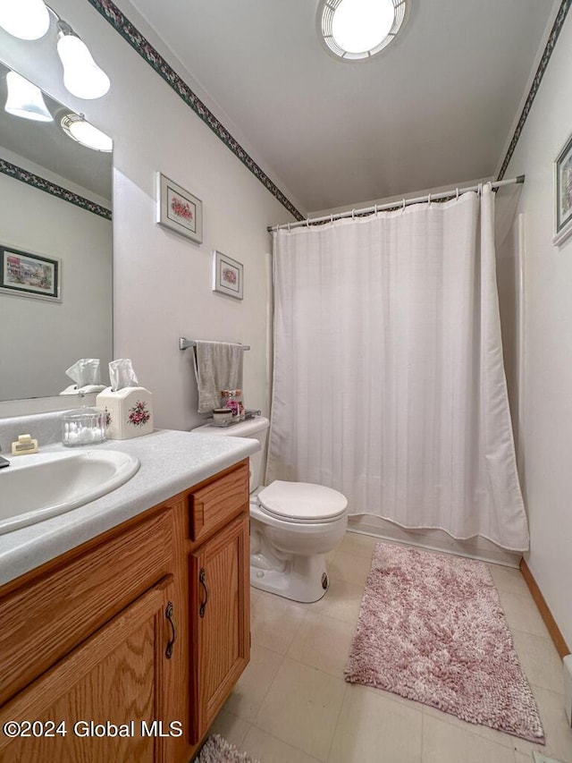 full bathroom featuring vanity, toilet, and shower / bathtub combination with curtain