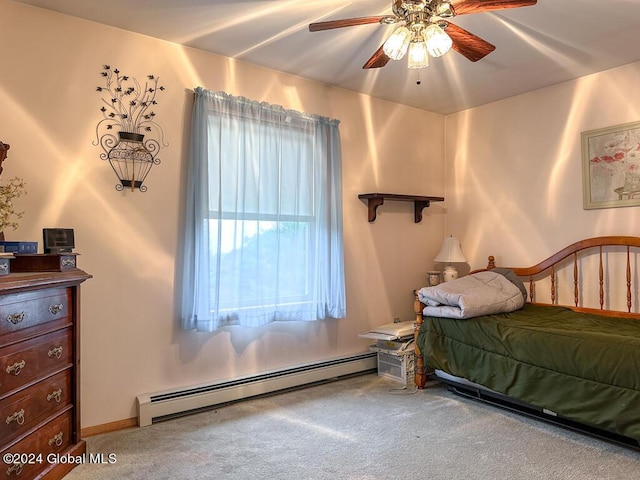 bedroom featuring ceiling fan, carpet, and a baseboard radiator