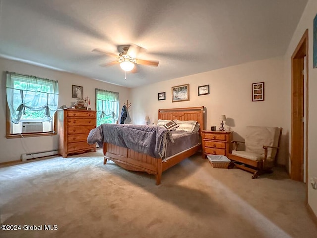 carpeted bedroom with baseboard heating, ceiling fan, and cooling unit