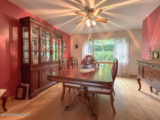 dining room featuring light hardwood / wood-style flooring and ceiling fan