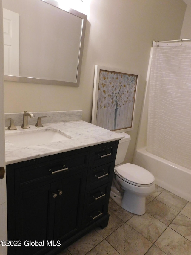 full bathroom with tile patterned floors, vanity, toilet, and shower / bathtub combination with curtain