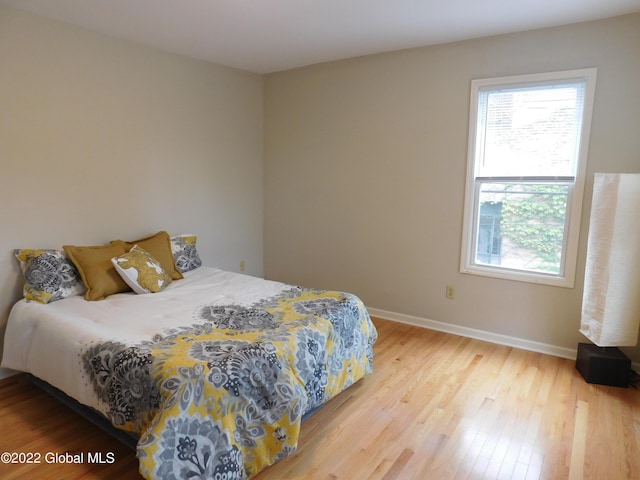 bedroom featuring hardwood / wood-style flooring