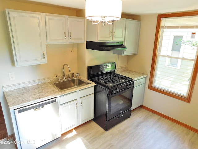 kitchen with black gas stove, stainless steel dishwasher, plenty of natural light, and sink