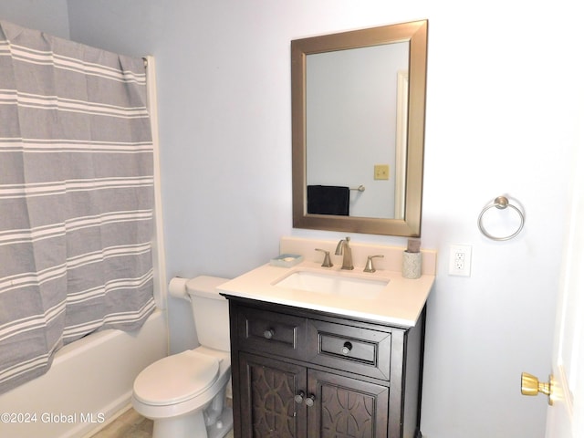 full bathroom with vanity, toilet, and shower / tub combo