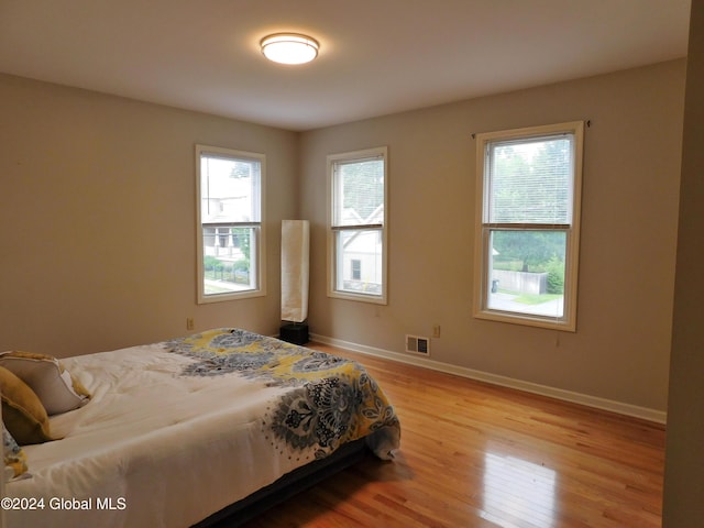 bedroom featuring light wood-type flooring