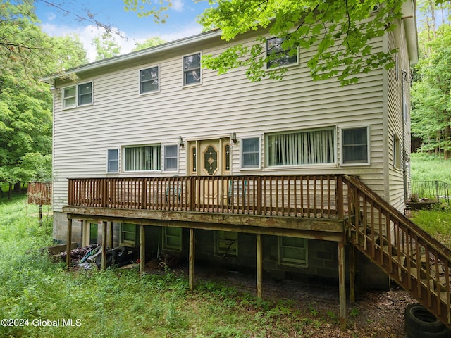 rear view of house with a deck