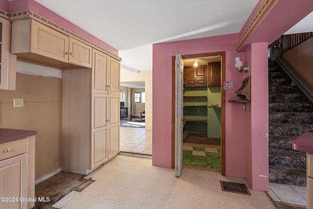 interior space featuring light brown cabinets