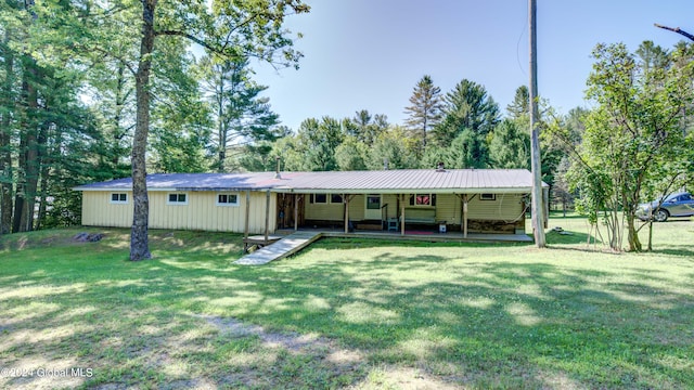 exterior space with a front yard