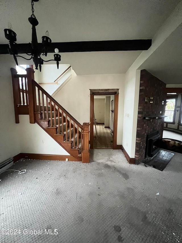 unfurnished living room with carpet flooring, beamed ceiling, and a chandelier