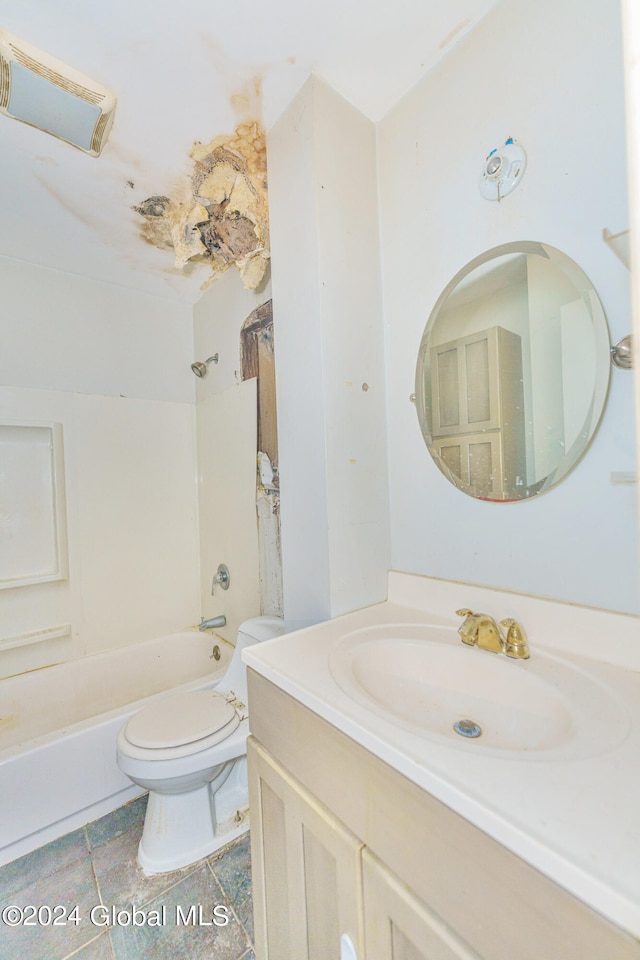 full bathroom featuring bathing tub / shower combination, vanity, toilet, and tile patterned floors