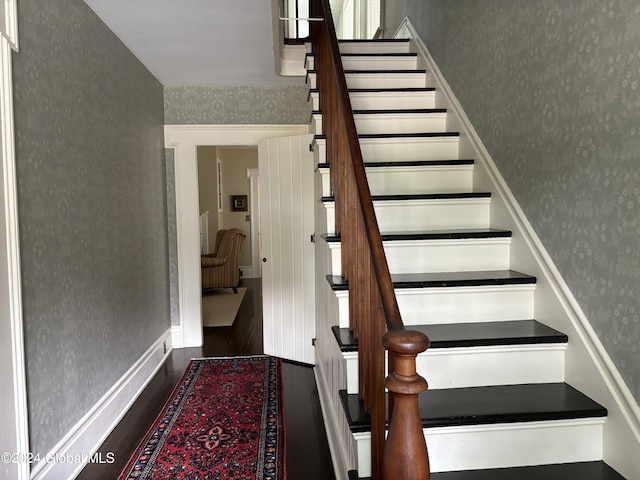 stairway with wood-type flooring