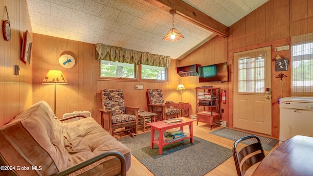 living area featuring wood finished floors and wooden walls