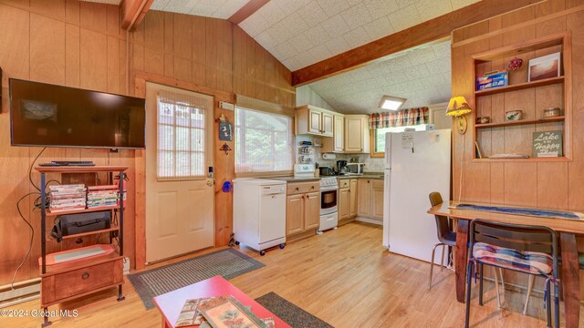 2769 State Route 8 # 2, Speculator, NY 12164 - kitchen featuring white appliances, wood walls, and light wood-style floors