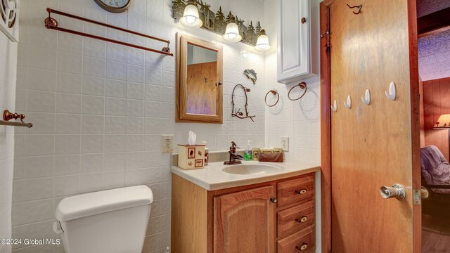 2769 State Route 8 # 2, Speculator, NY 12164 - half bath with toilet, vanity, and tile walls