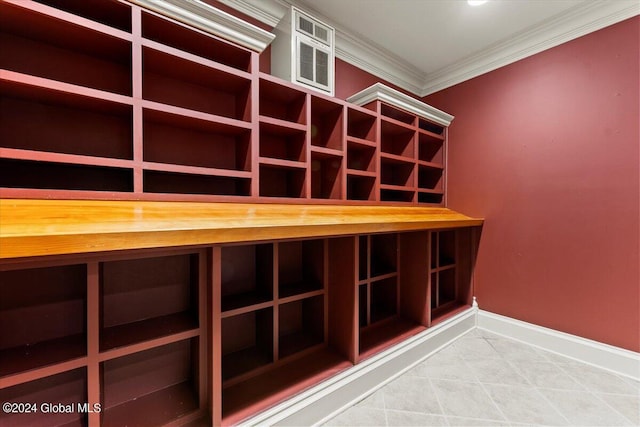 wine area with ornamental molding