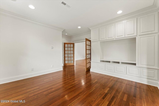 unfurnished living room featuring french doors, dark hardwood / wood-style floors, and ornamental molding