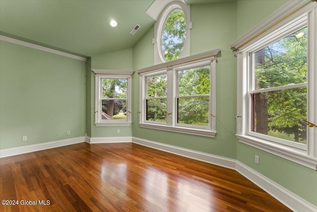 unfurnished sunroom with vaulted ceiling